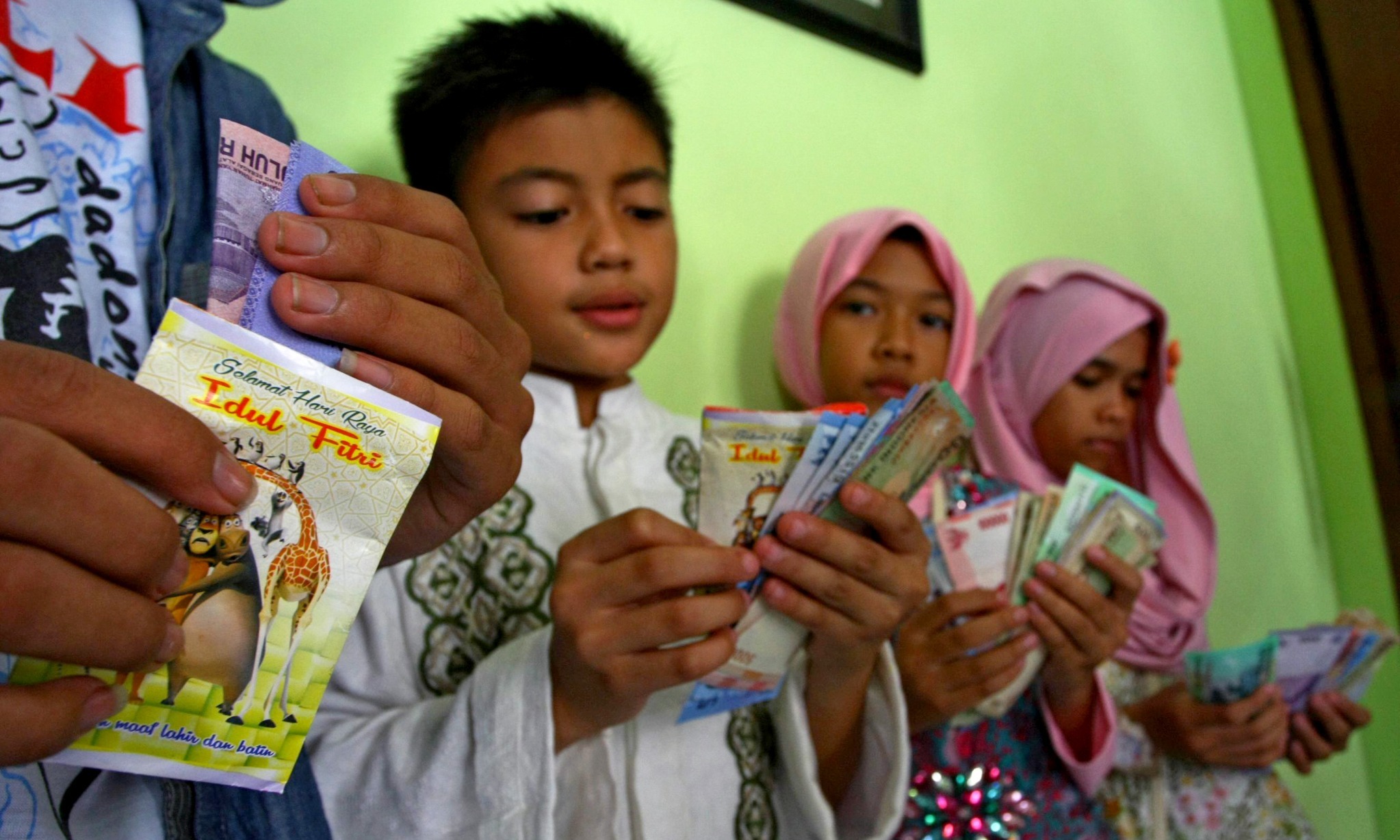 Asal Mula Tradisi 'Angpau' Lebaran