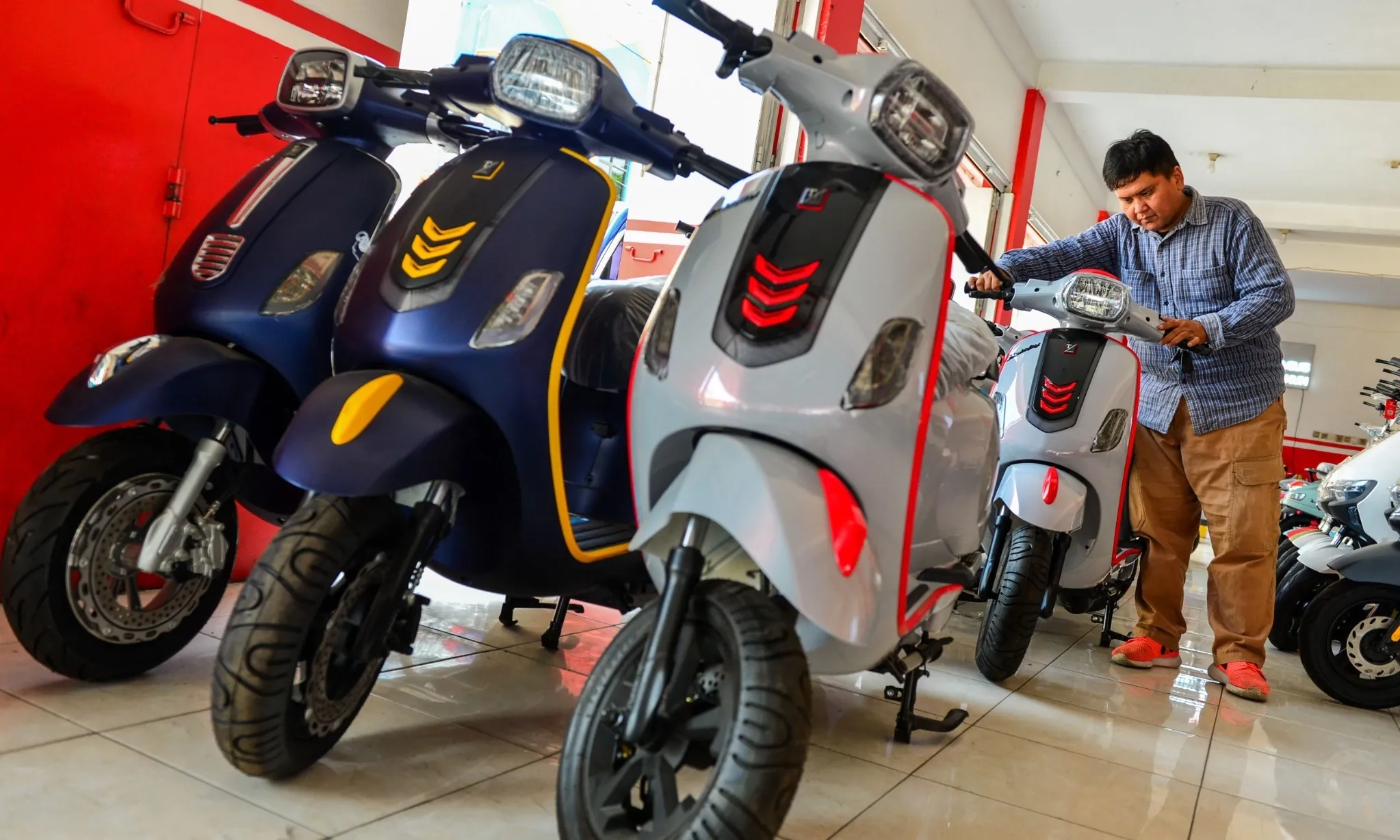 <p id="isPasted">MTI Desak Pemerintah Cabut Subsidi Motor Listrik</p>