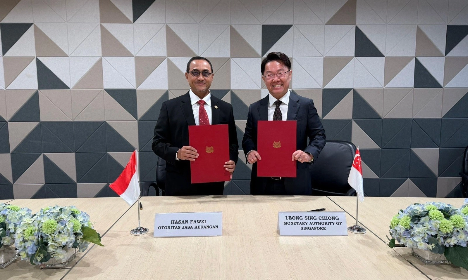 <p>OJK-MAS Singapura Teken MoU Kolaborasi <em>Fintech</em> Lintas Batas</p>