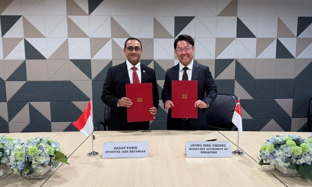 <p>OJK-MAS Singapura Teken MoU Kolaborasi <em>Fintech</em> Lintas Batas</p>